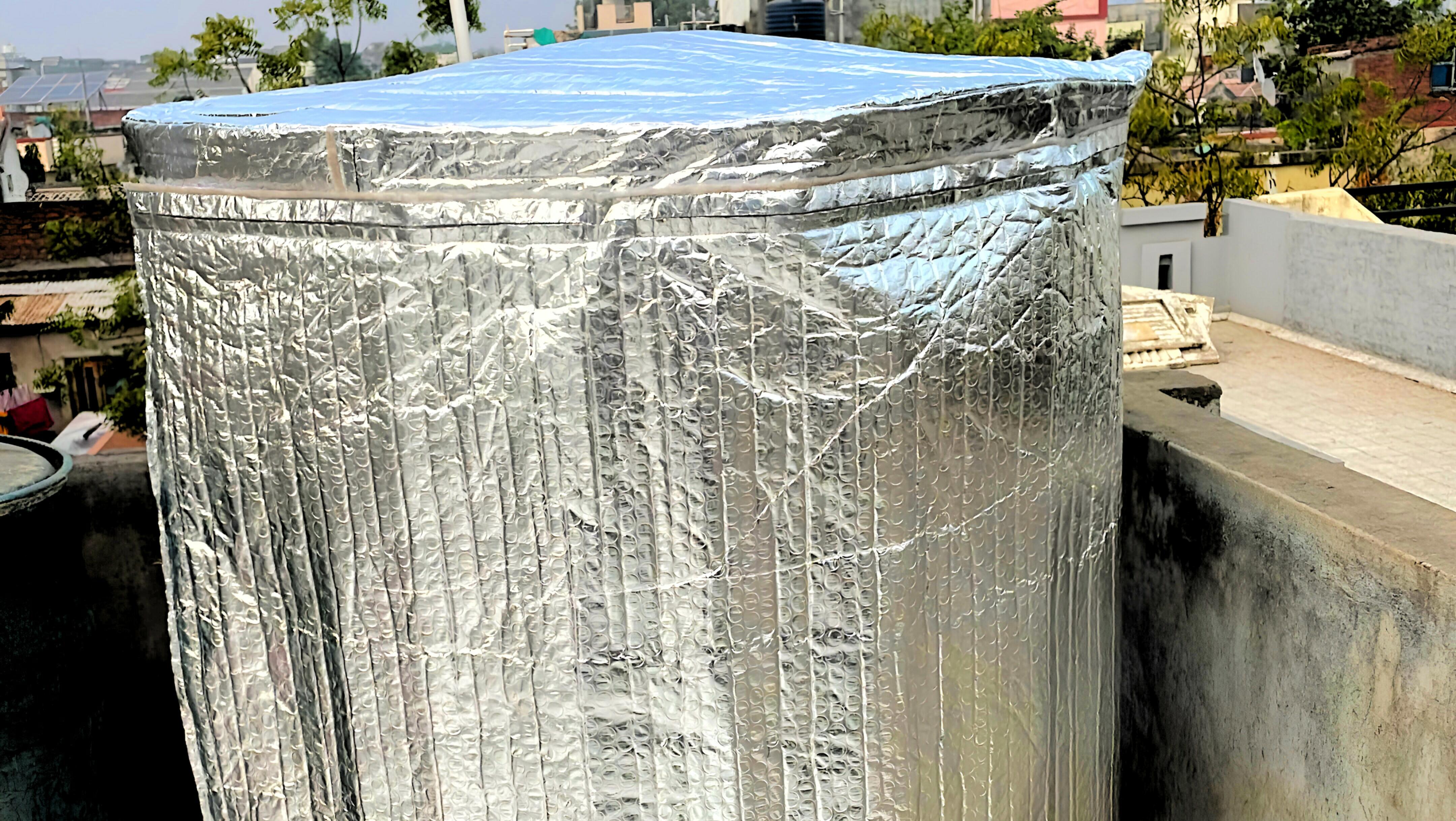 Water tank cover to protect from contaminants and environmental damage